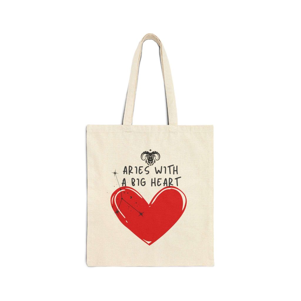 Canvas tote bag featuring a bold red heart with the Aries constellation and the phrase 'Aries with a Big Heart' in a playful handwritten font. Designed for Aries zodiac lovers who embrace their fiery passion and generosity