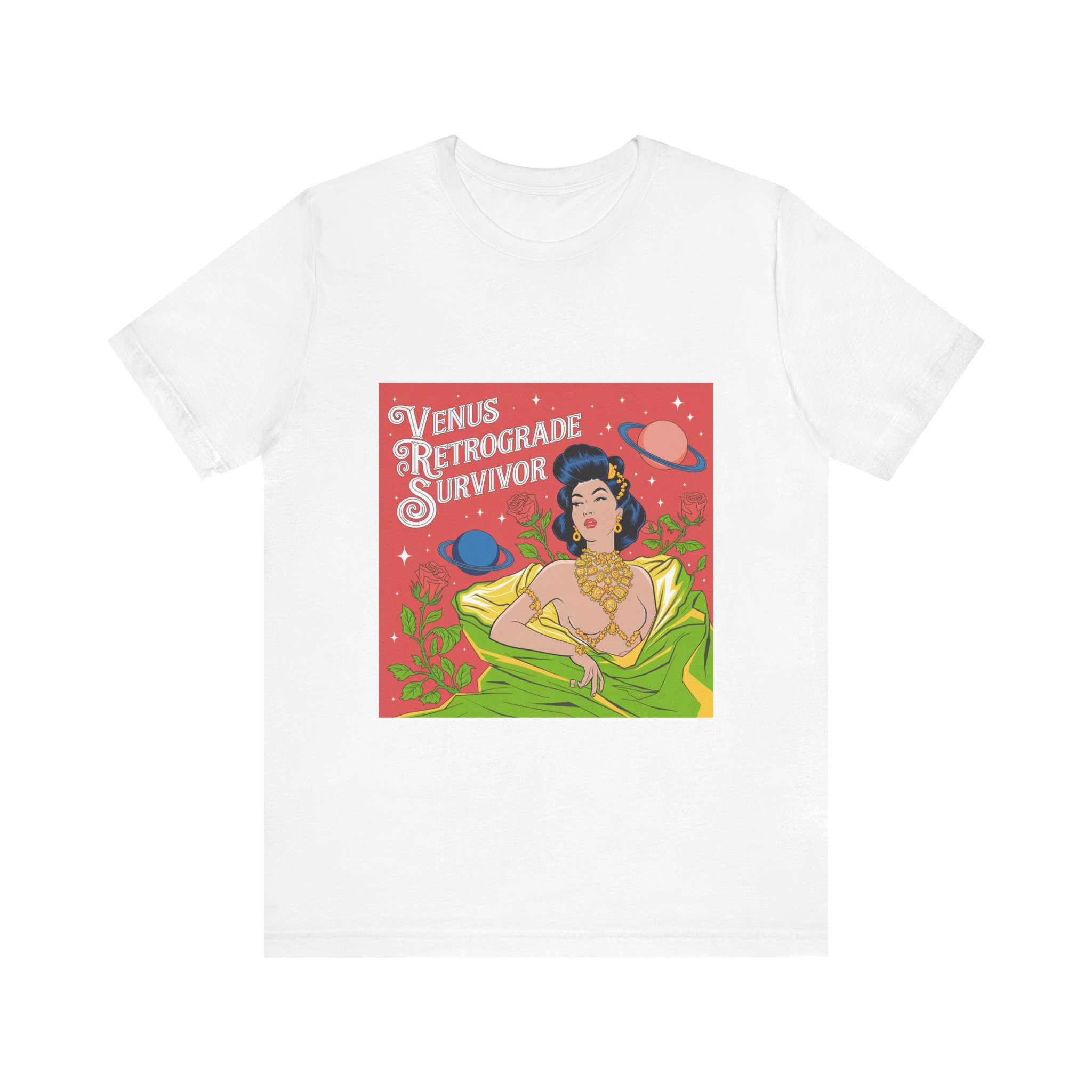 White t-shirt featuring a colorful graphic titled “Your Planetary Trauma is Showing” with bold red and green tones and a cosmic illustration, photographed on a plain white background.