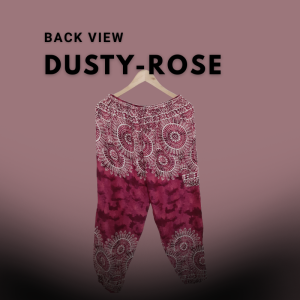 Pair of tall fit harem pants in dusty rose with intricate white mandala patterns, displayed on a hanger against a muted rose background
