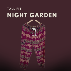A pair of burgundy boho-style harem pants with intricate elephant and paisley prints, displayed on a wooden hanger against a dark maroon background with the text "Full Fit NIGHT GARDEN".
