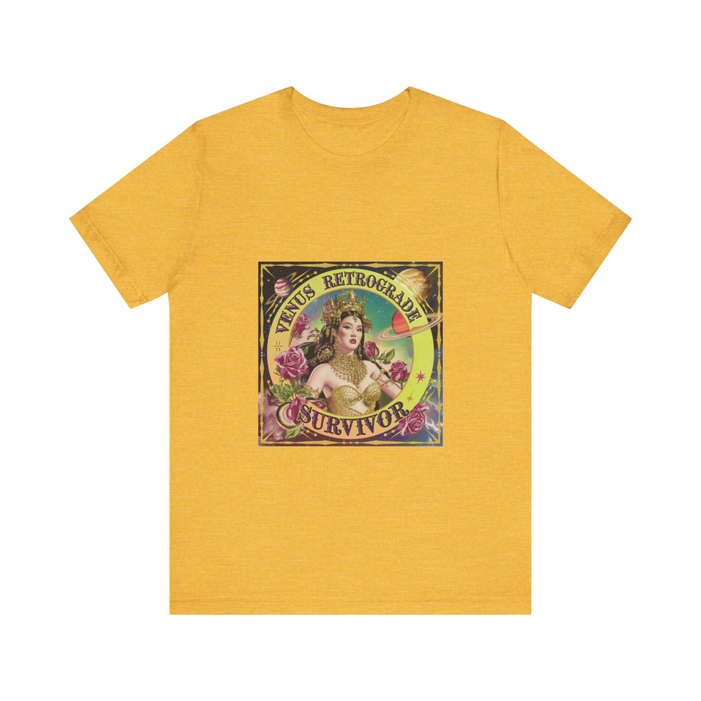 Carousel of vibrant astrology-themed merchandise featuring colorful T-shirts with designs like "Venus Retrograde Survivor" in white, pink, and yellow; graphic tees with zodiac hearts and playful slogans; and a black tote bag printed with "Bad Bitch Astrology" – perfect for cosmic fashion lovers.